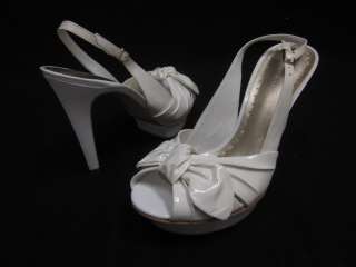 are bidding on bcbgirls white patent leather peep toe platforms pumps 