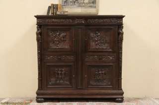 Carved Oak Cabinet, Knights and Scenic Panels  