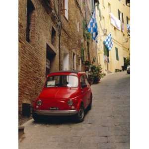  Red Car Parked in Narrow Street, Siena, Tuscany, Italy 