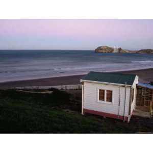  Beach Hut and Castlepoint Lighthouse at Dusk, Castlepoint 