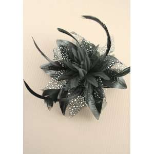  FASC7908   Large black flower and net fascinator on a 