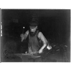  Blacksmith at work,C.H. Gilbert,c1910