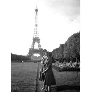  Two Women Sightsee in Paris, Standing Near the Eiffel 
