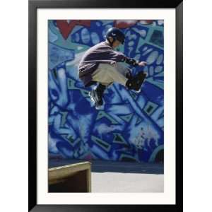  Boy in Rollerblades Jumping Collections Framed 