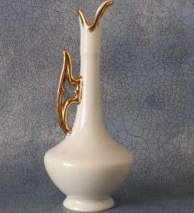 Entire Item is 5 1/2 inches tall. This is a vintage vase
