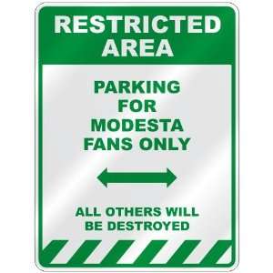   PARKING FOR MODESTA FANS ONLY  PARKING SIGN