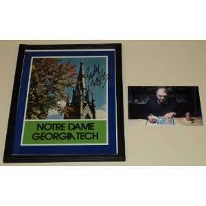   DAME FRAMED FOOTBALL COVER SIGNED BY RUDY RUETTIGER 
