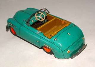 1950s TIN FRICTION CONVERTIBLE TOY CAR MADE IN JAPAN  