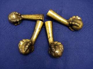  legs or feet for table or piano stool. The legs has brass claw feet 