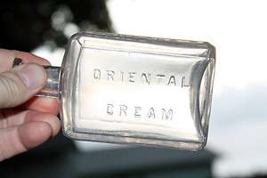 Gourads Oriental Cream New York, Clear/Purpling Antique Bottle  