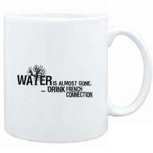 Mug White  Water is almost gone  drink French Connection  Drinks