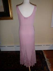 The dress appears to be in very nice condition given its age. It is 