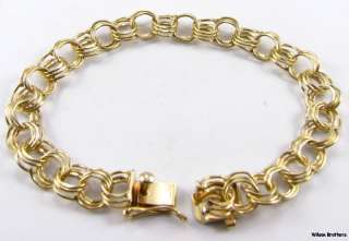  yellow gold this fine estate bracelet features a triple link design 
