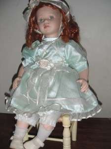   gif border 0 a td tr table div realistic porcelain sitting girl doll