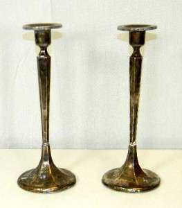Pair Sterling silver candle stick marked sterling on the bottom. The 