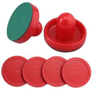   of Two Red Air Hockey Pushers and Four Red Pucks