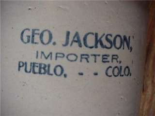 ANTIQUE STONEWARE WHISKEY JUG GEO JACKSON IMPORTER PUEBLO COLORADO 