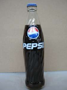 PEPSI BOTTLE HAS REFRESCO SABOR COLA ON IT NEVER OPENED  